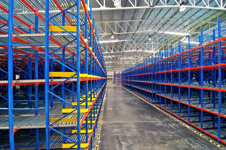Warehouse rack inspection specialist evaluating pallet racking systems